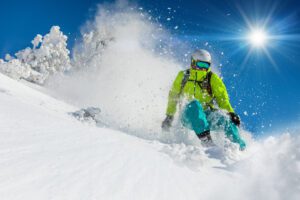 Man skiing powder